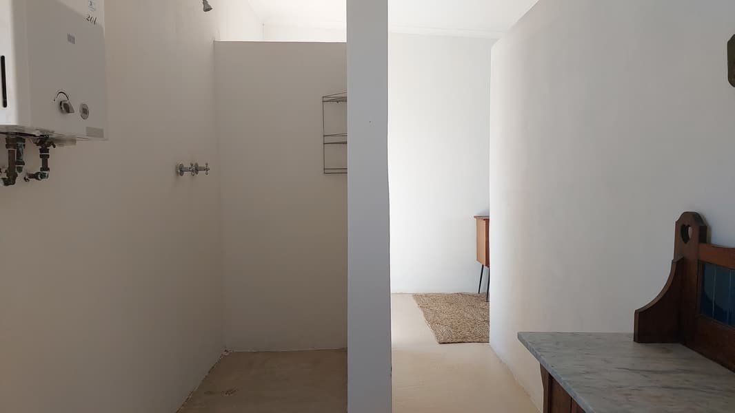 Walk-in shower in the flatlet bathroom
